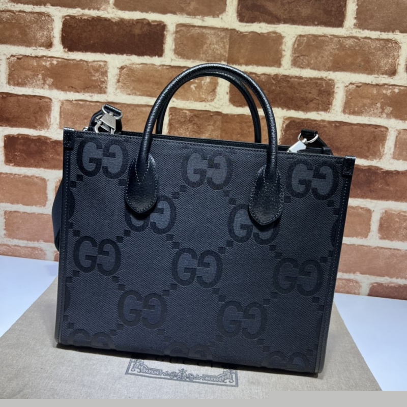 G*u*i shopping bags